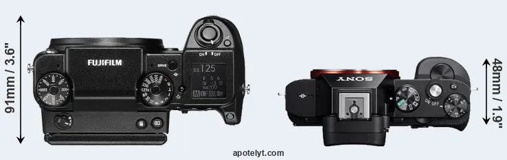 Compare GFX 50S versus A7 top